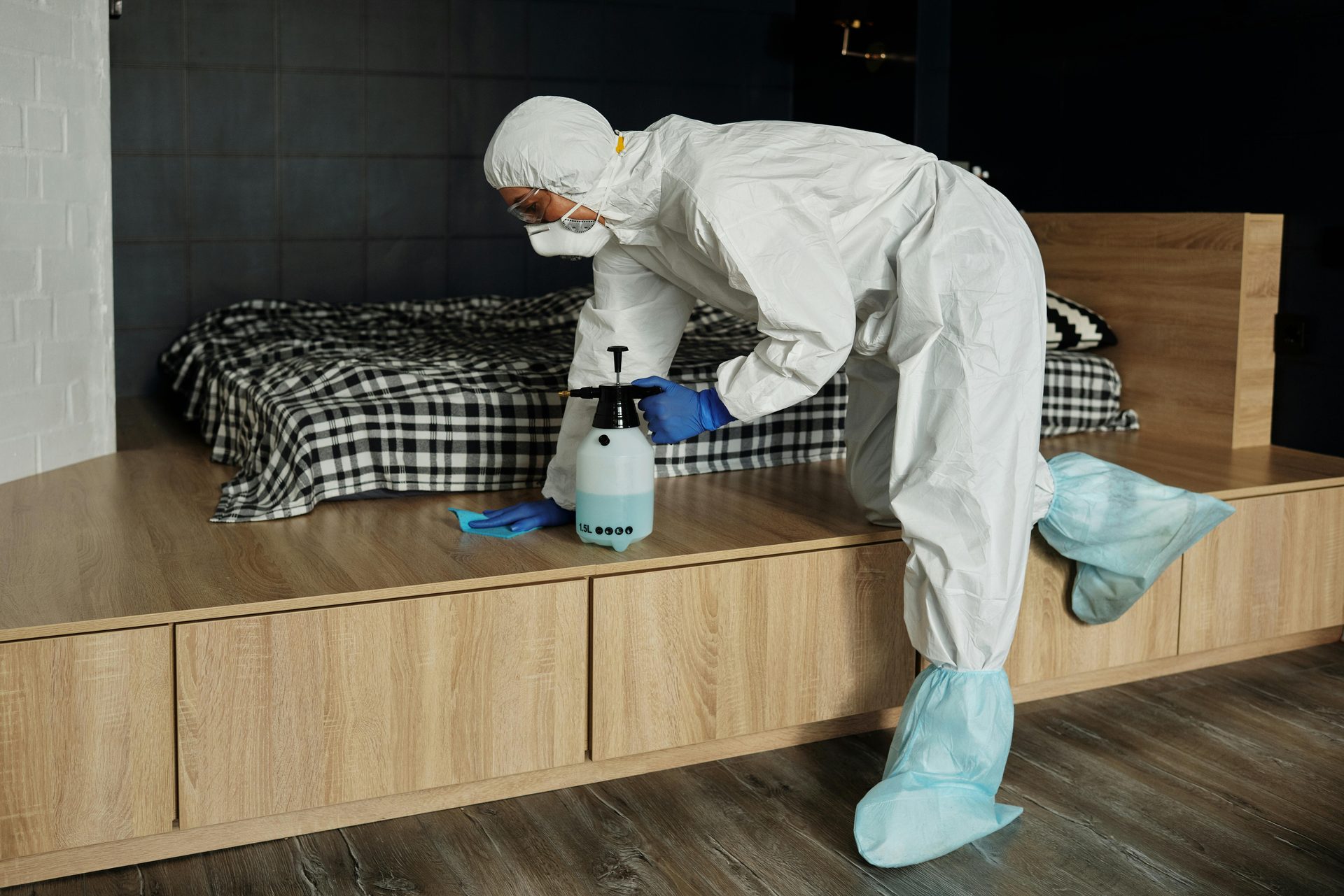 Bed bug treatment being conducted in Gauteng bedroom